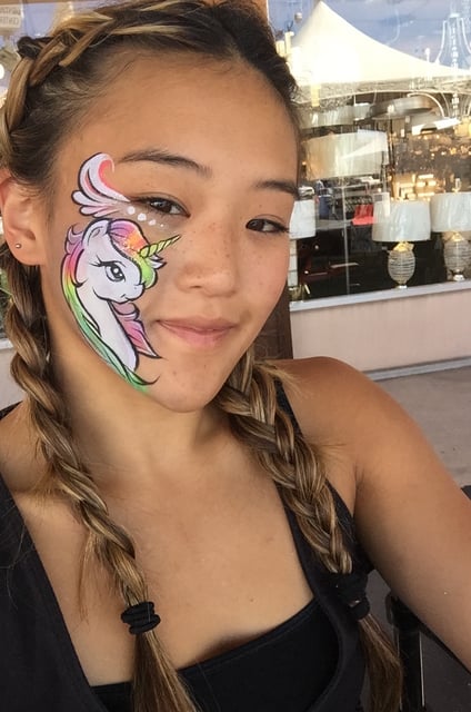 Caroline with a Unicorn Face Painting at a Las Vegas Event