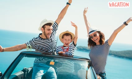 a family of three people standing in front of a car
