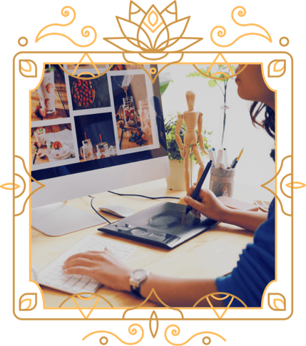 a woman working on a digital tablet and computer in a victorian frame
