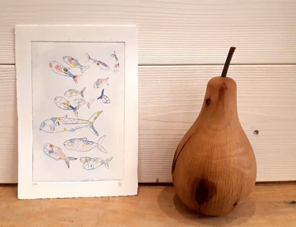 a pear tree in front of a picture of a pear tree