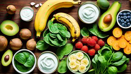 a variety of fruits and vegetables on a wooden table
