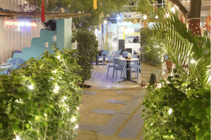 Relaxing ambiance, coffee, and greenery at Basil The OtherSide, Ahmedabad.