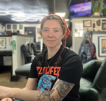 a woman tattoo artist profile picture