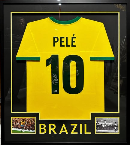 Signed Pele jersey with two 8x10 photos