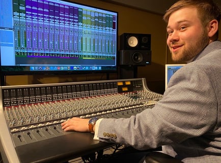 Andrew Wimple focusing on recording