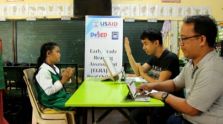 a man and a woman sitting at a table