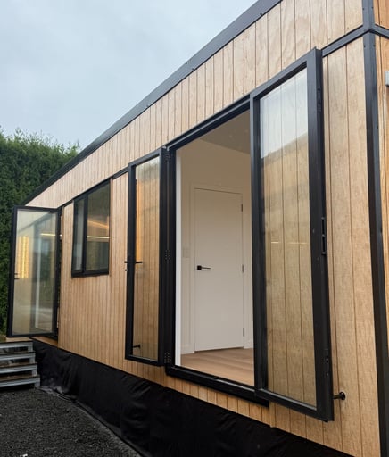 large, open doors on tiny home