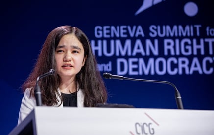 Nila Ibrahimi speaking the Geneva Summit for Human Rights and Democracy. 