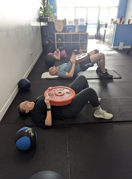 glute press with weighted plates