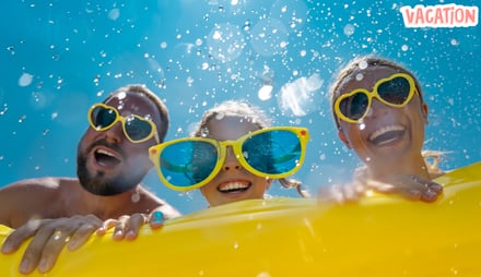 a man and woman in sunglasses are having fun in the sun