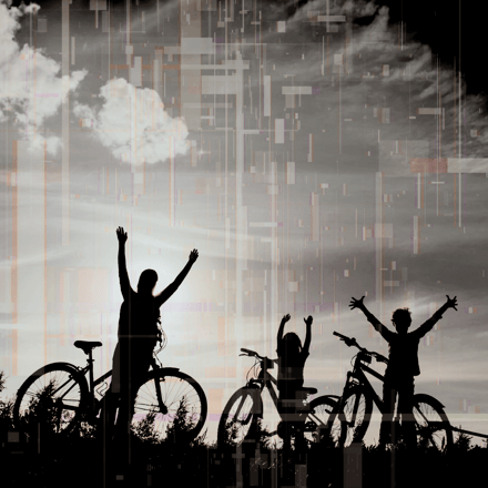 a group of people standing around a bicycle