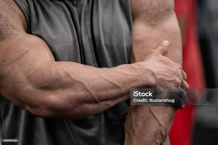a man with a large arm and arm muscles