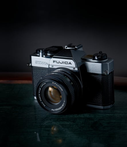 a camera with a lens attached to it
