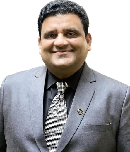 a man in a suit and tie with a tie