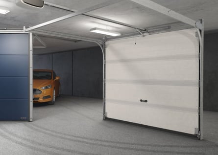 a garage door with a yellow car parked in front of it