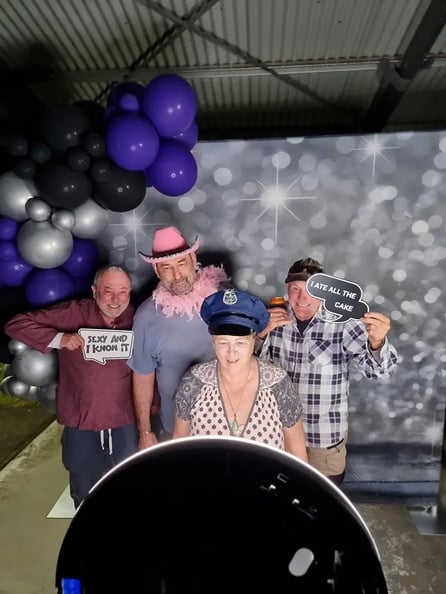 Daune and her friends in the photo booth having a session at the end of the night.