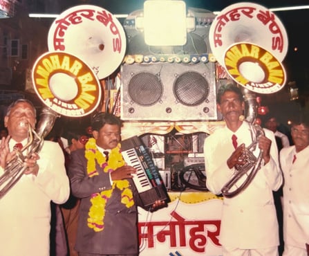 Manohar Brass Band in the old days, fully geared with all equipment and performing enthusiastically.