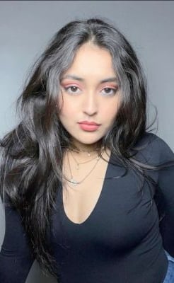 Divorcee escort Megha relaxing in a luxury apartment in Gurugram