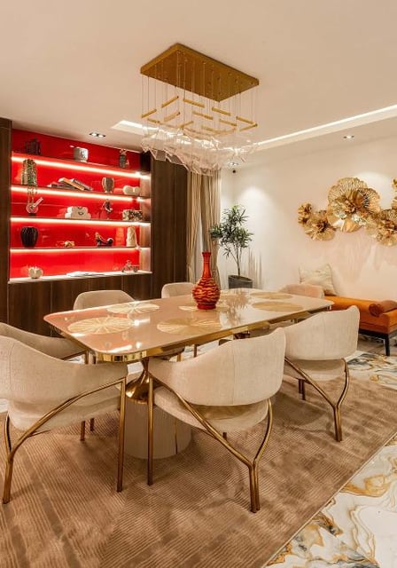 a dining room with a table and chairs