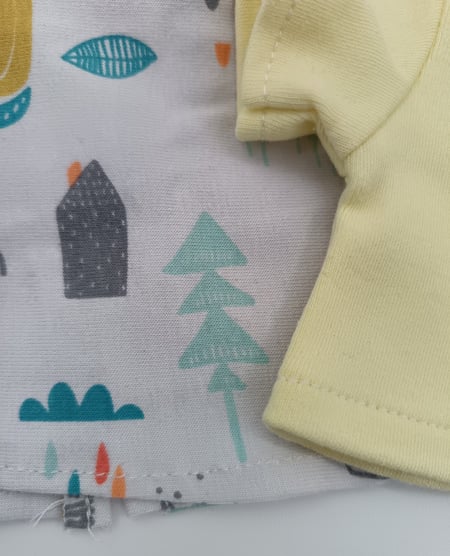 Colourful top cut with grain in wrong direction and yellow top with grain in correct direction