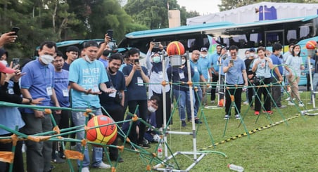 a large of people playing together at team building