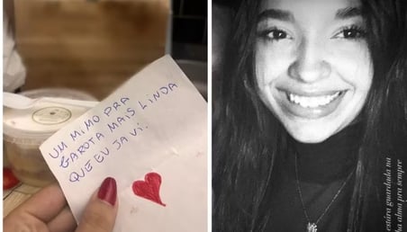 a woman holding a note card with a notepad on it