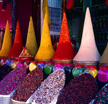 a variety of spices and spices are displayed in a variety of different colors