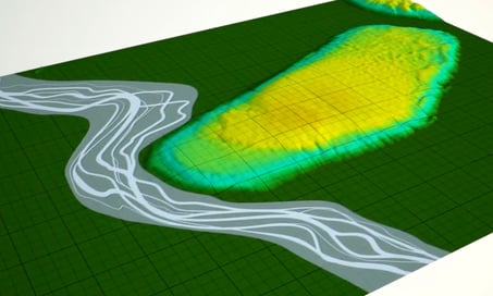 hill with a river running near it