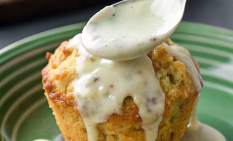 mini chicken meatloaf with creamy sauce on a plate