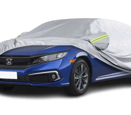 a car covered in a grey cover with a car cover