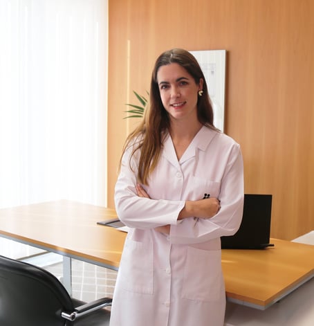 Dr. Maria Martínez, fertility specialist and Fertie’s medical advisor, standing in her clinic office