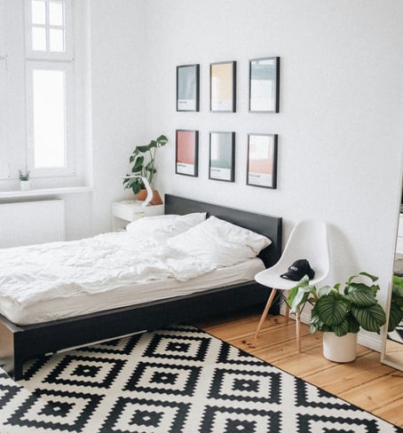 chambre lumineuse lit double plantes cadres