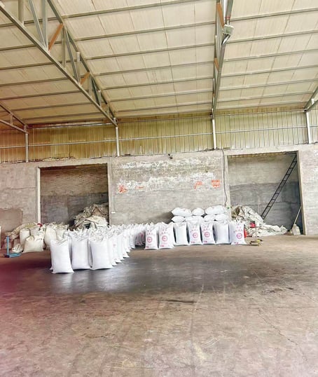 a warehouse with bags of Sichuan peppercorn