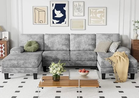 a couch with pillows and pillows on it