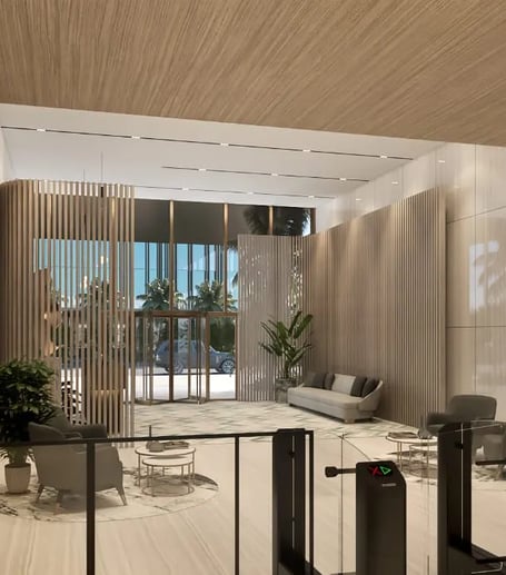 Retail frontage with branded stores beneath contemporary office blocks in One Ninety’s commercial