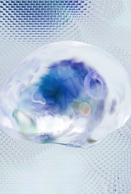 a clear glass ball with a blue and white background