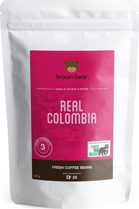 Paquet de café 'Brown Bear | Real Colombia' en grains entiers.