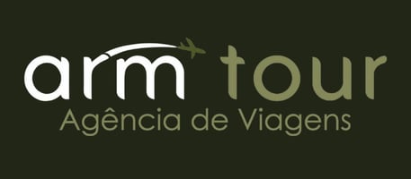 a man in a suit and tie with a gun