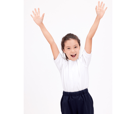 young girl raising her hands excitedly