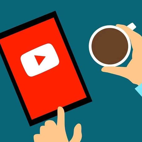 A tablet displaying the YouTube interface, emphasizing mobile access to video content.