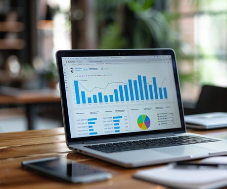 Laptop Displaying Metrics: Fractional Content Strategy