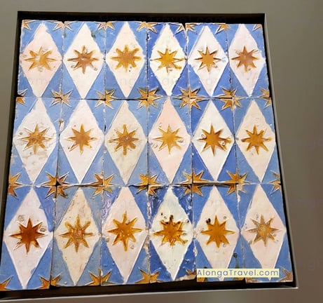 Fun blue & white shapes with stars form arabesque patterns on tiles in Royal Alcazar in Seville