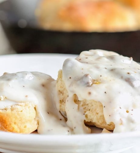 a plate sausage Biscuits and gravy