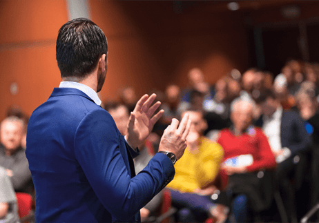 A speaker giving public speaking training