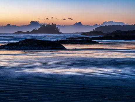 a group surf lesson at a beach near Tofino BC