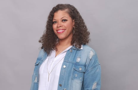 Picture of a woman against a grey background