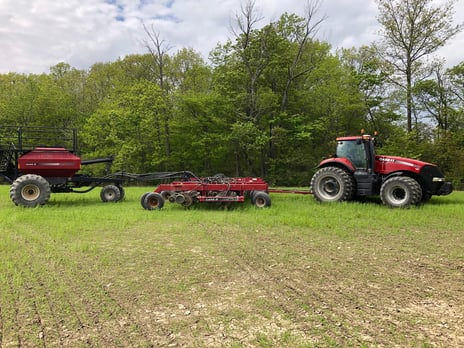 Magnum 340 with SDX30 Air Drill planting cover crop