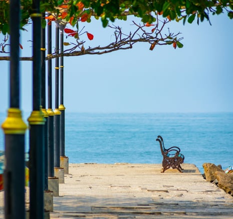 a bench with a bench and a bench in the sand