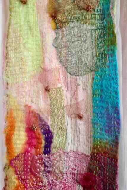 Hand stitched sampler on silk & metal