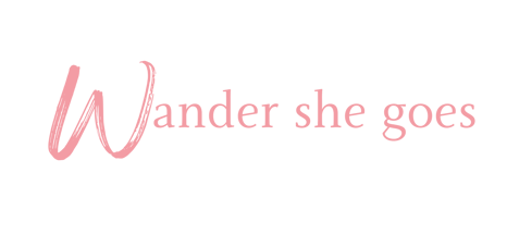 Wander She Goes logo